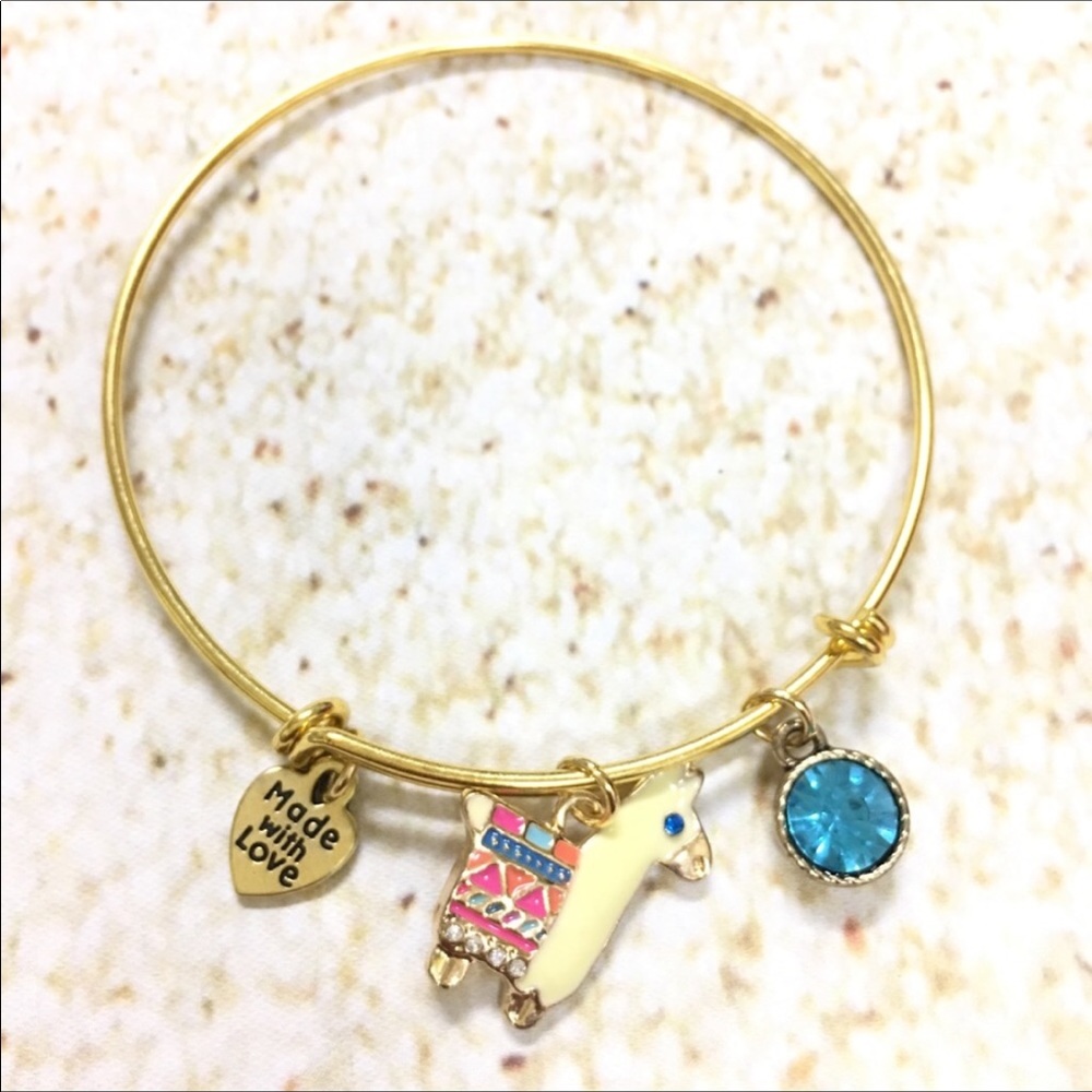Adjustable gold plated alpaca charm bracelet
